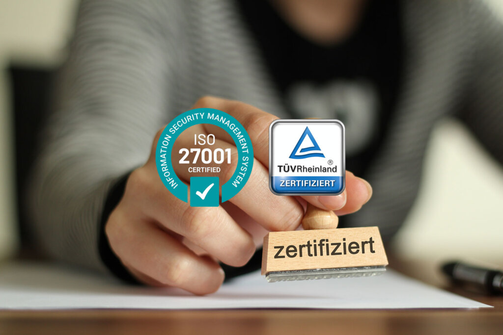 Das Bild zeigt das Prüfsiegel vom TÜV Rheinland für die ISO 27001 Zertifizierung, die nexnet erhalten hat.