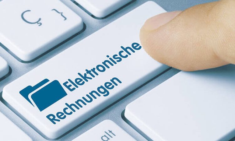 Illustration of a keyboard with the Enter key labeled: Electronic invoices