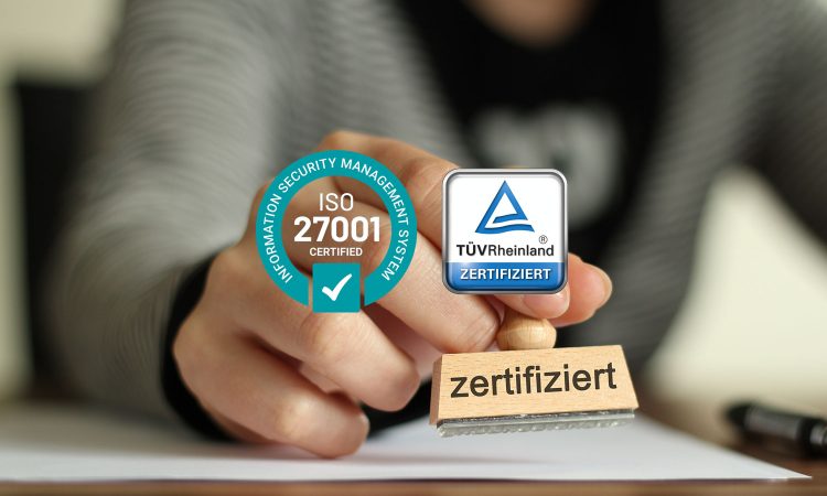 The picture shows the seal of approval from TÜV Rheinland for the ISO 27001 certification that nexnet has received.